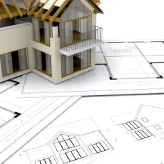 Model domu na planach architektonicznych. Czas oczekiwania na pozwolenie na budowę może być długi, ale wizualizacja projektu jest już gotowa.